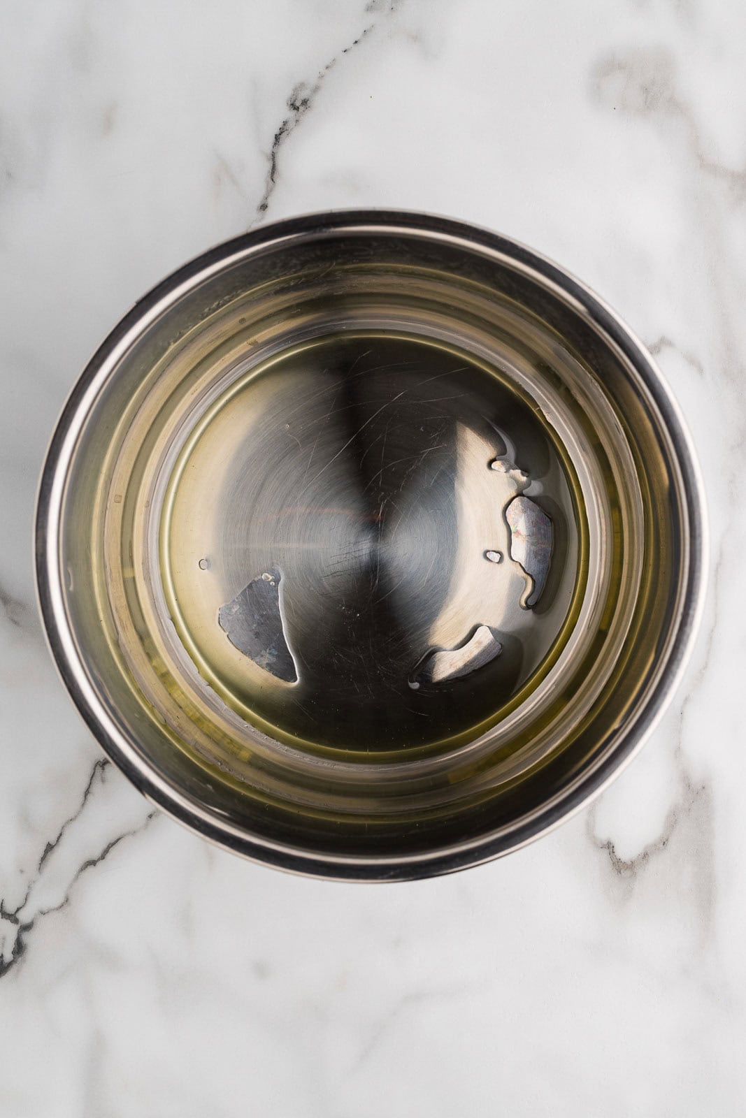 overhead view of instant pot with avocado oil
