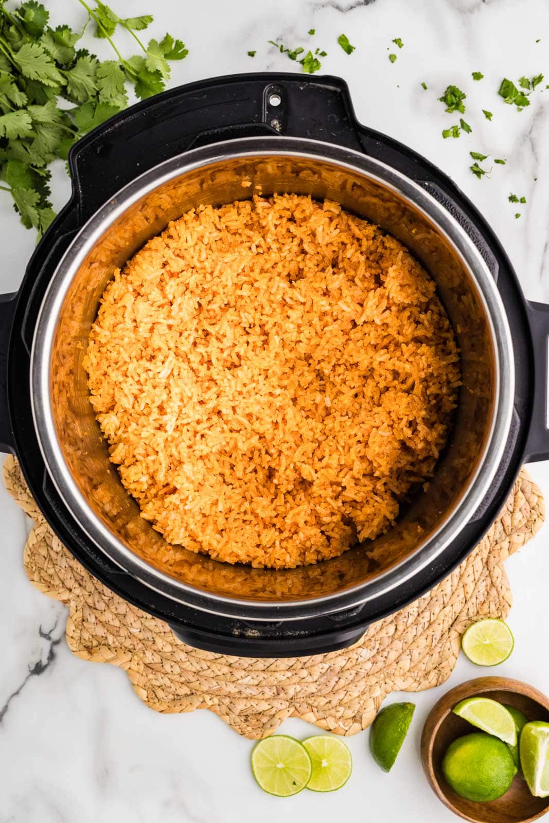 overhead view of instant pot with cooked Spanish rice
