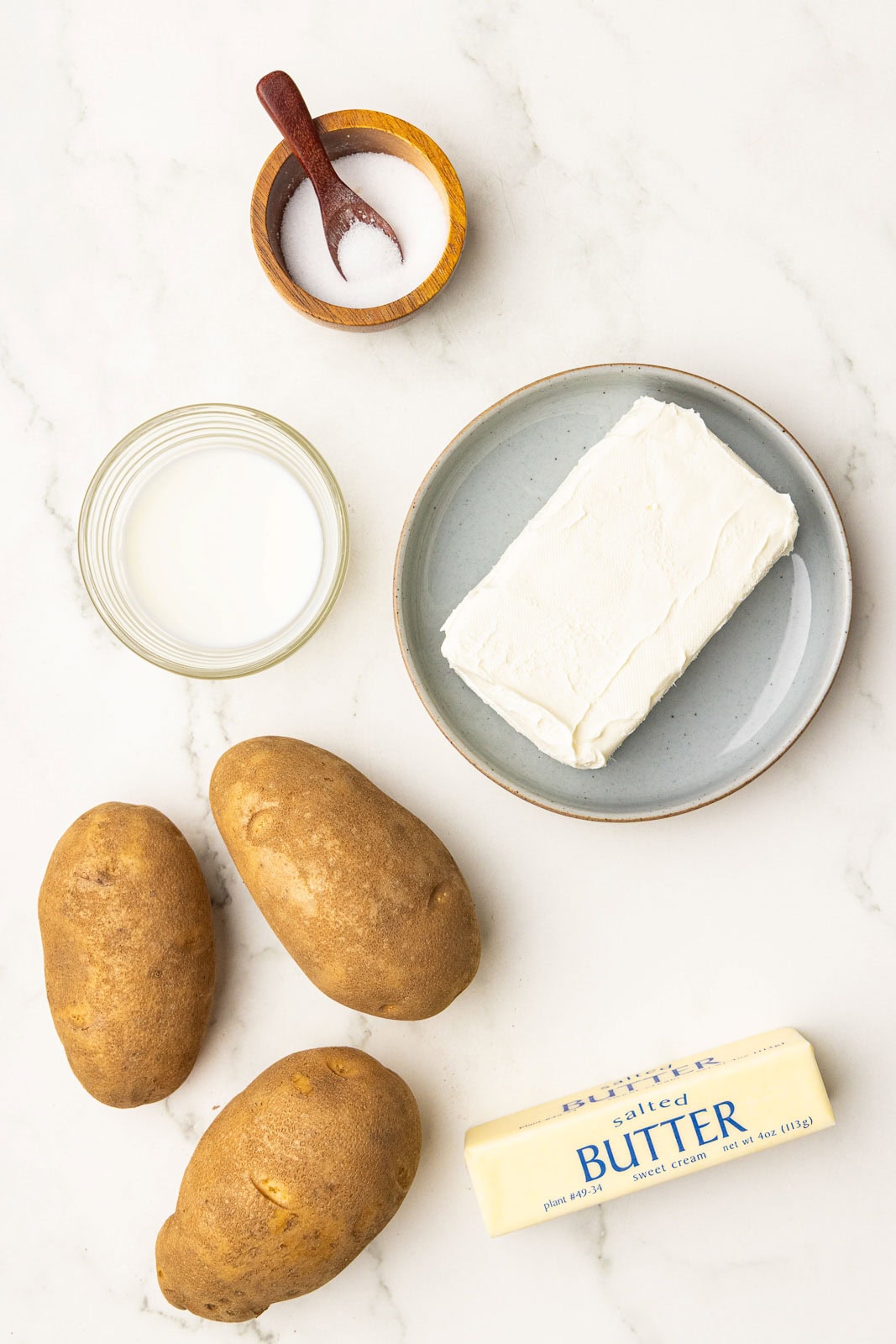 ingredients to include 3 russet potatoes, butter, cream cheese, milk and salt