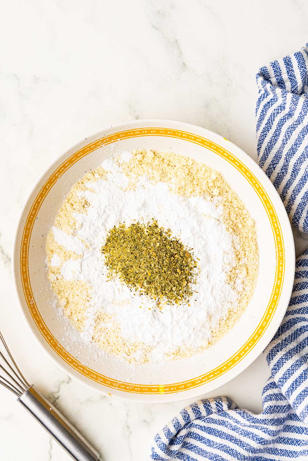large white bowl with almond and tapioca flour and seasonings