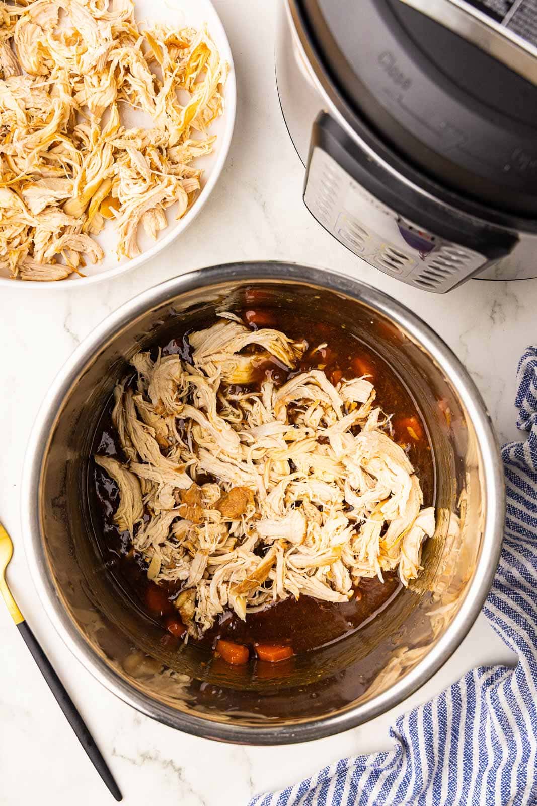 instant pot bowl with shredded chicken, juice and carrots with bowl of shredded chicken and instant pot on side